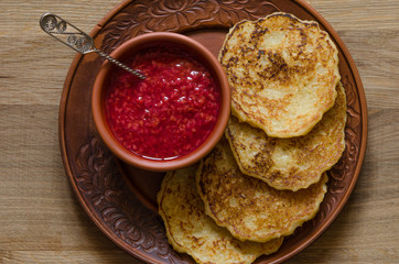 Vegan pancakes with apple and raspberry coolies