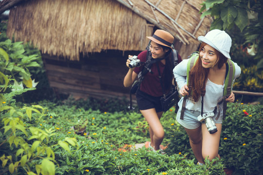 Woman tourists traveling to rural villages.