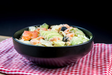 Delicious fresh salad and olive oil