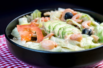 Delicious fresh salad and olive oil