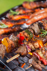 Barbecue grill with tasty skewers, close-up.