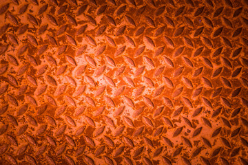 Red metal non slip surface background.