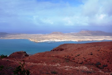 Landscape over Island La Graciosa taken from north of Lanzarote. Canary Islands. Spain.