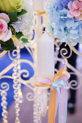 Candles decorated with ribbon