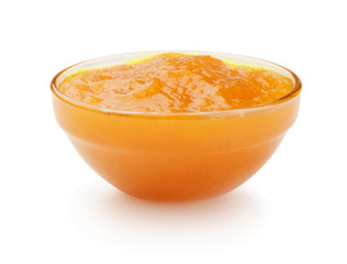 Apricot jam in a glass bowl isolated