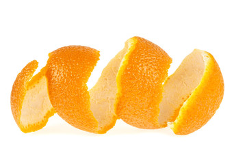 Single orange peel on a white background