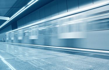 Moving subway train at metro station