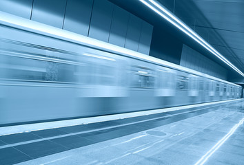 Fototapeta na wymiar Moving subway train at metro station