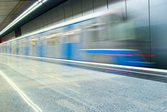Moving subway train at metro station