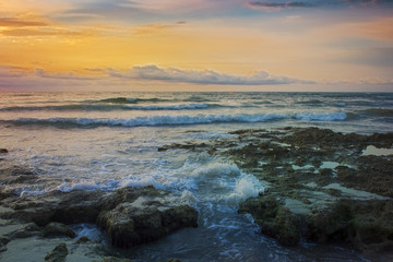 Sunrise on the beach and clouds