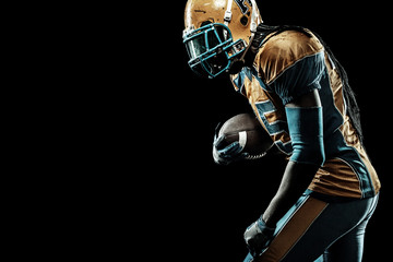 American football sportsman player isolated on black background