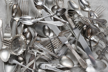 Silverware on a linen fabric