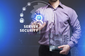Business, Technology, Internet and network concept. Young businessman working on a virtual screen of the future and sees the inscription: Server security
