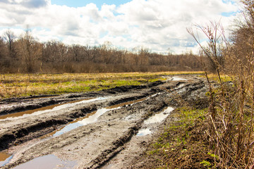 Spring landscape. Dirty spring road. Impassability and mudslides 3