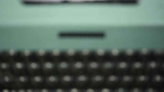 Typing Success word on vintage typewriter.