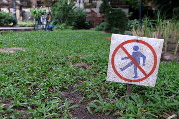Keep Off the Grass Sign in Park.
