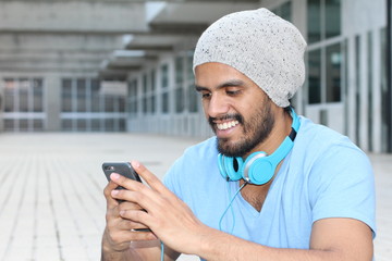 Obraz na płótnie Canvas Boy Wearing Headphones And Listening To Music - Stock image