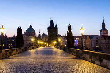 Charles Bridge (Karluv Most) and Old Town Tower, the most beautiful bridge in Czechia. Prague, Czech Republic.