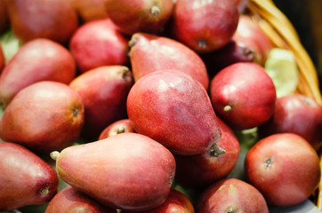 Bunch of red pears in supermarket