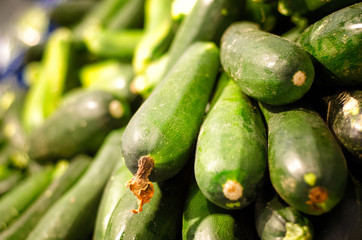 Fresh zucchini in supermarket