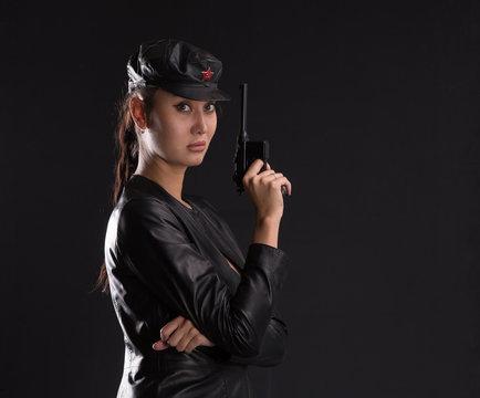 Chekist, Soviet girl in military uniform and with a pistol