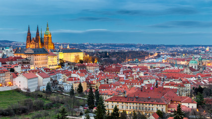 Prague Castle complex with gothic St Vitus Cathedral, Hradcany, Prague, Czech Republic. UNESCO World Heritage. Panoramic aerial shot from Petrin Hill.