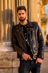 Young man on the sunny street
