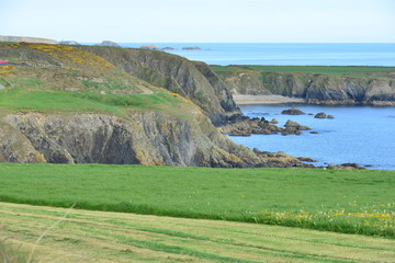 Looking down at Benvoy beach and cliffs from the road of the copper route
