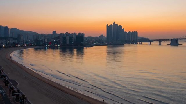 Sunrise view of Busan, South Korea. Gwangan bridge and city center. Time lapse