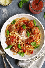 Spaghetti with meatballs in tomato sauce.Top view.