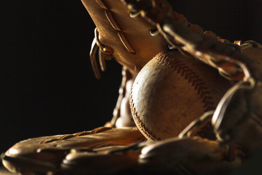 Close up image of an old used baseball