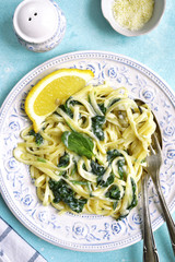 Creamy lemon spinach pasta.Top view.