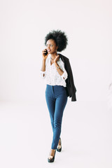 Young african american business woman talking on the phone