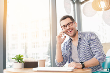 Young stylish man in cafe