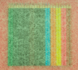 many colored pencils on a pink background