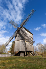 Fototapeta na wymiar Old wooden windmill in Kashubian Ethnographic Park in Wdzydze Kiszewskie. Poland.