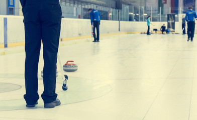 Obraz premium Playing a game of curling.