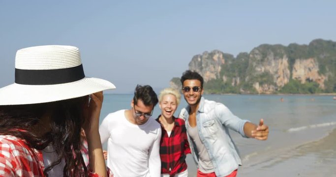 Girl Welcome People Group To Take Selfie Photo On Beach On Cell Smart Phone Happy Cheerful Tourists On Vacation Slow Motion 60
