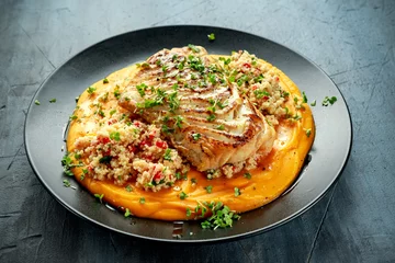 Photo sur Plexiglas Plats de repas Soy-glazed cod loin fillet with cous-cous salad on butternut squash puree