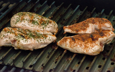 Four Grilled Chicken Breasts on Grill Grates Aluminum Inserts 