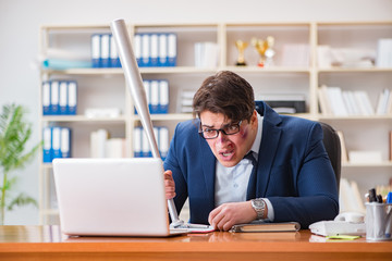 Obraz premium Angry aggressive businessman in the office