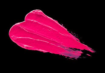 Smudged lipstick pink on a black isolated background