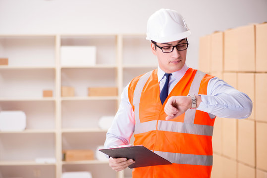 Man Working In Postal Parcel Delivery Service Office