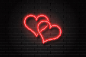 Vector isolated realistic heart neon signs on the wall background.