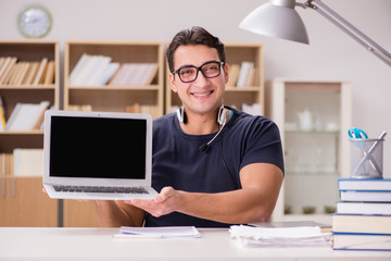 Young freelance worked working on computer