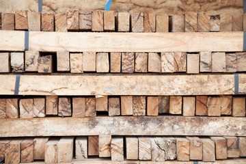 Stacked wooden pallets in  buy garbage shop for recycle