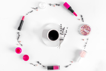 set of cosmetics for women with lavender office background top view mockup