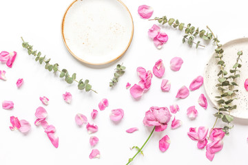 Spring trendy disign with flowers on white table background top view mock up