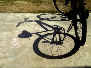 Naklejka na ściany i meble bicycle shadow on ground