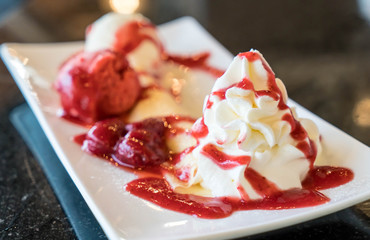 crape with ice-cream and whipped cream